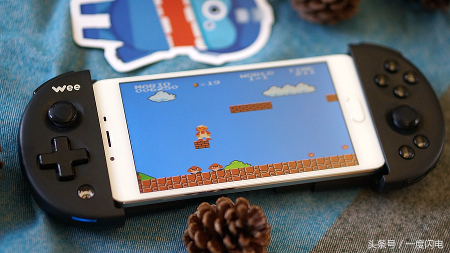 飞智wee手柄支持ios15.0,飞智游戏手柄wee拉伸手柄