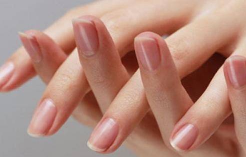 指甲盖凹陷还伴有月牙过大,手指上的月牙过大是什么原因