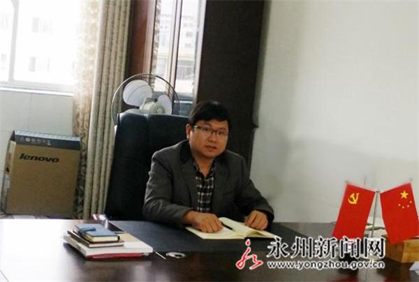 守望桃园的青年——记永州市第十六中学青年校长唐煜