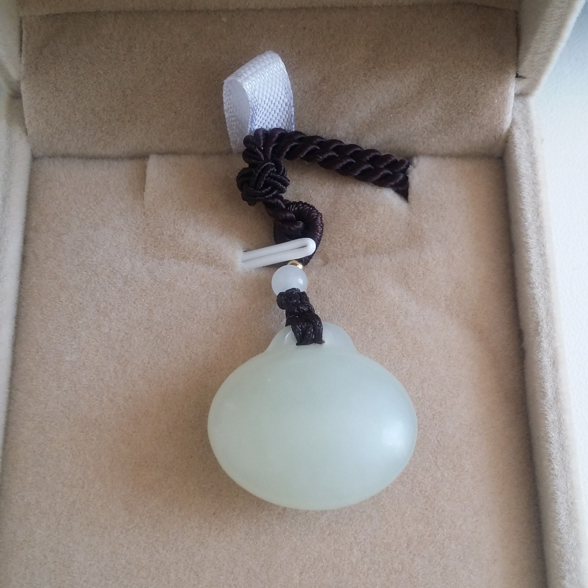 说一下我入手的第一块小石头（和田玉锁）