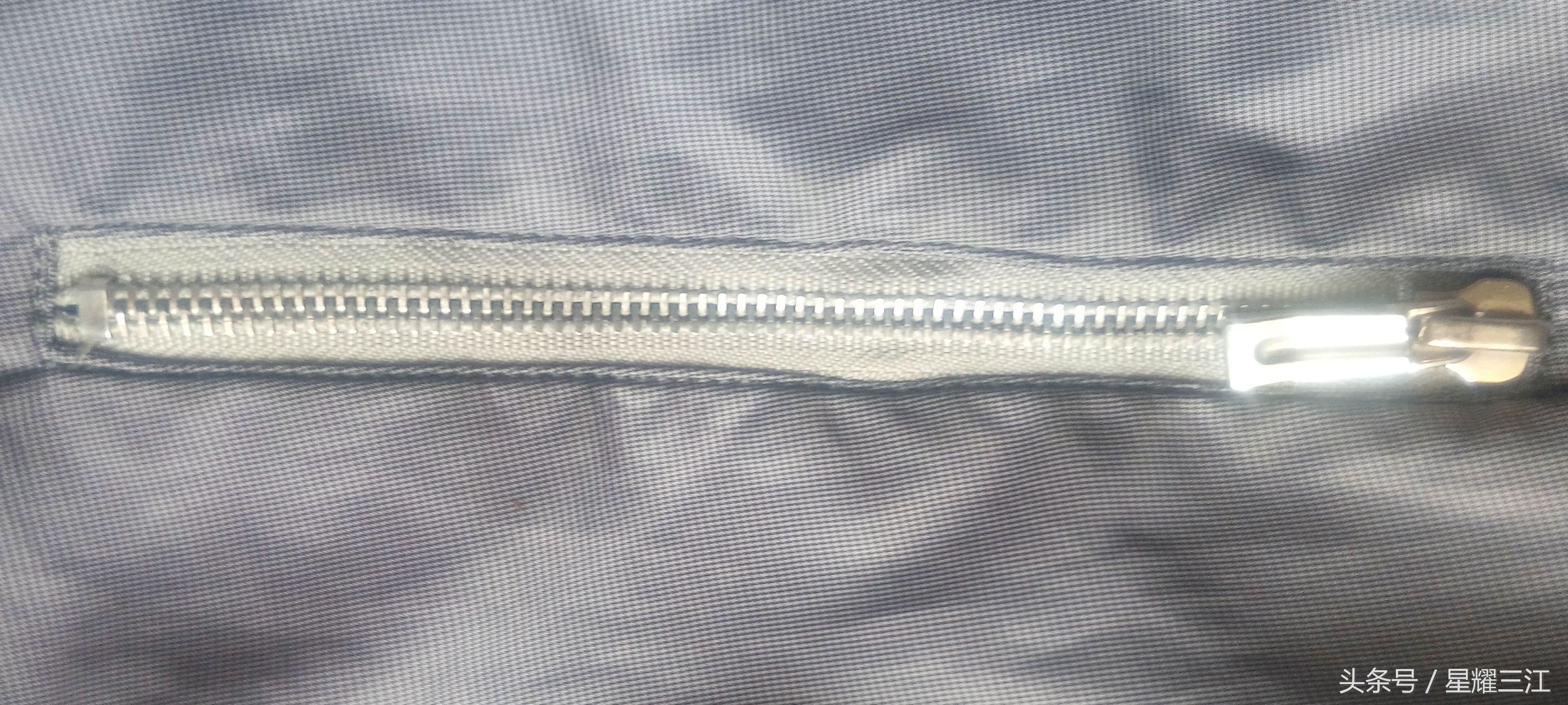 门锁易拉出来怎么修,门锁拉链