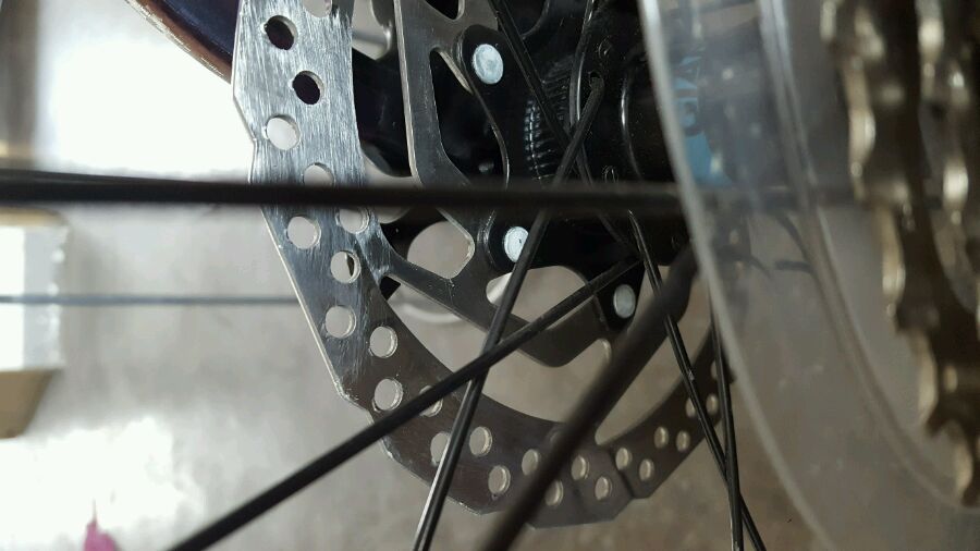 山地车碟刹一直蹭碟怎么办,山地车蹭碟彻底解决方法