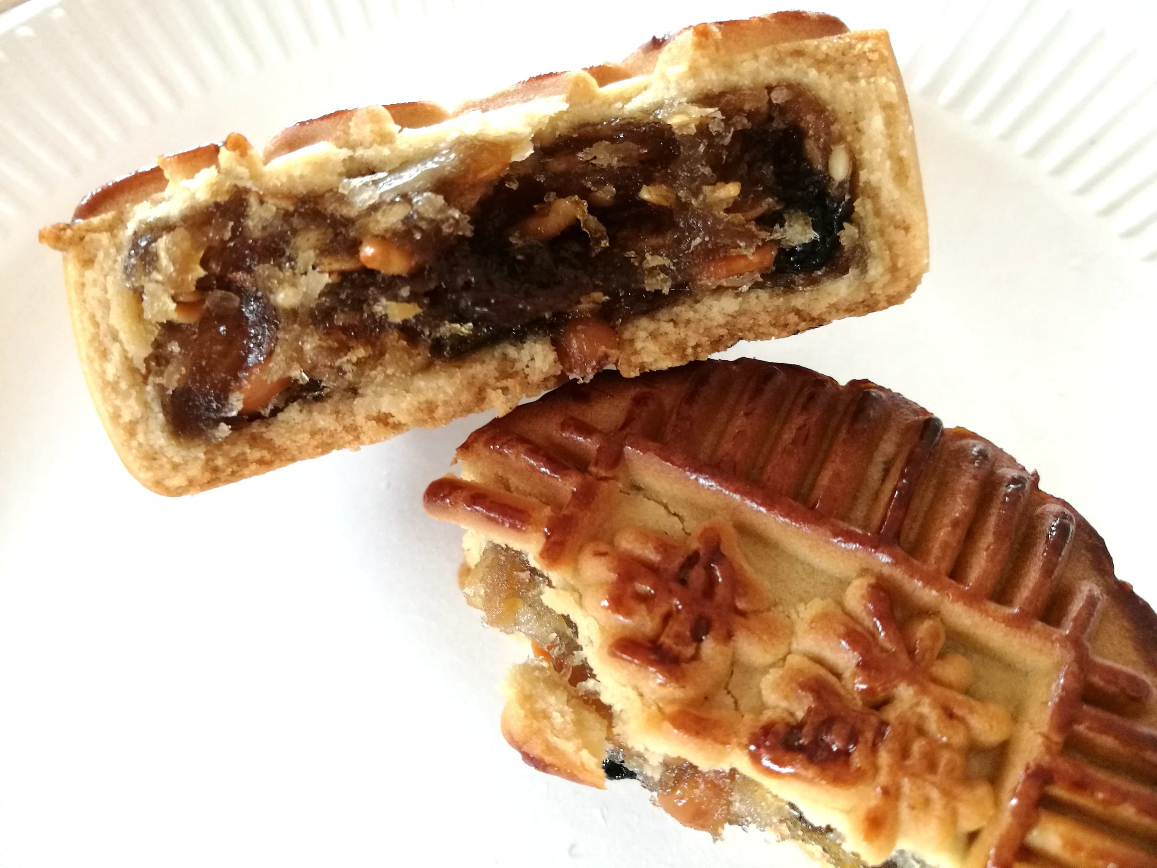 每多吃一块月饼要跑80公里,吃一块月饼需跑11公里才能消耗完