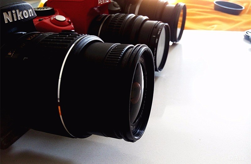 佳能尼康人像对比入门,尼康佳能入门长焦