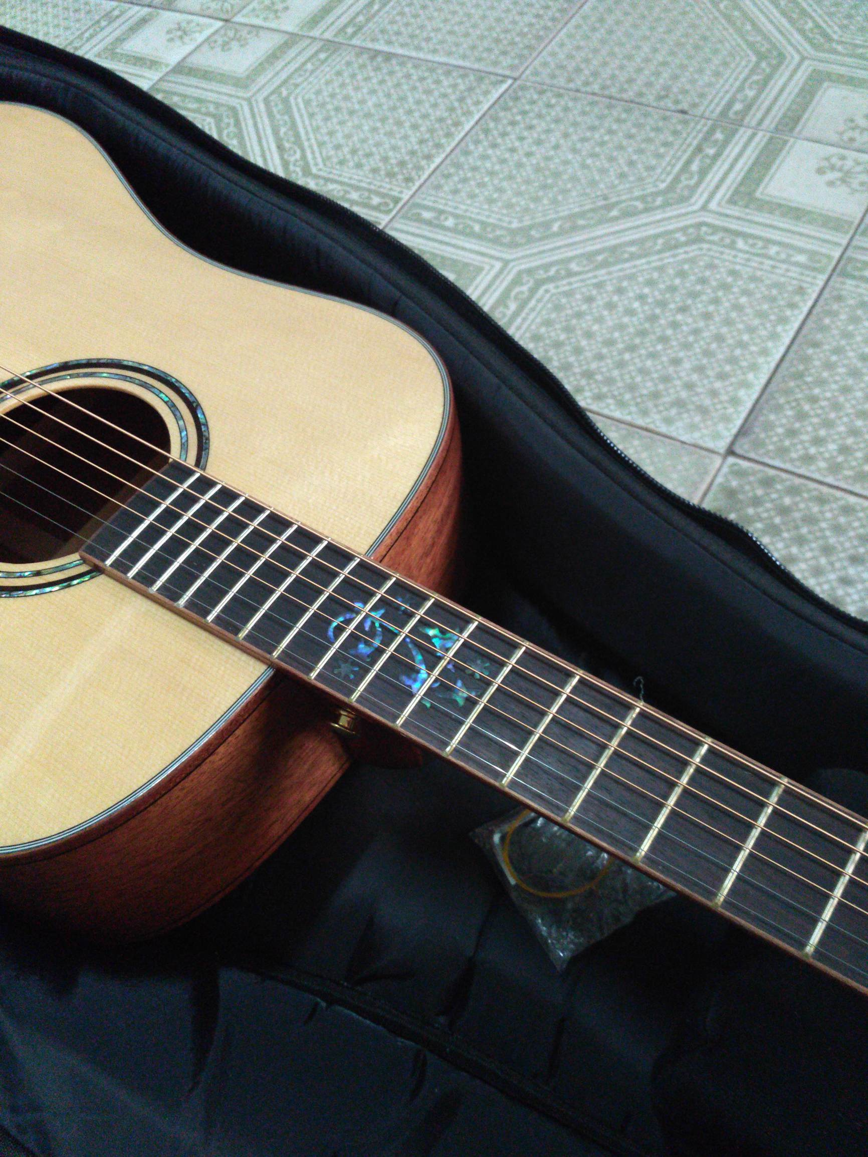 初学者木吉他选什么好,合板吉他和全单吉他怎么区别