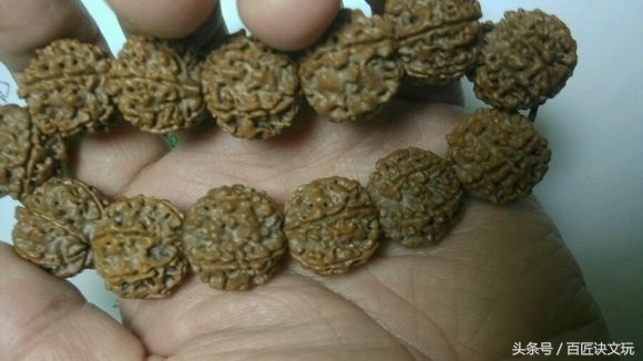 娜姐说文玩,盘玩多年的橄榄核开裂了怎么修复