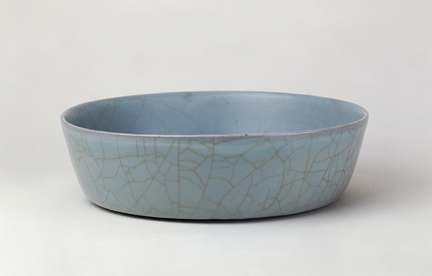 修内遗来千年，紫口铁足，纹如冰之裂