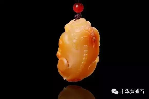 顶级的黄蜡石与和田玉的区别,老干皮顶级黄蜡石原石图片