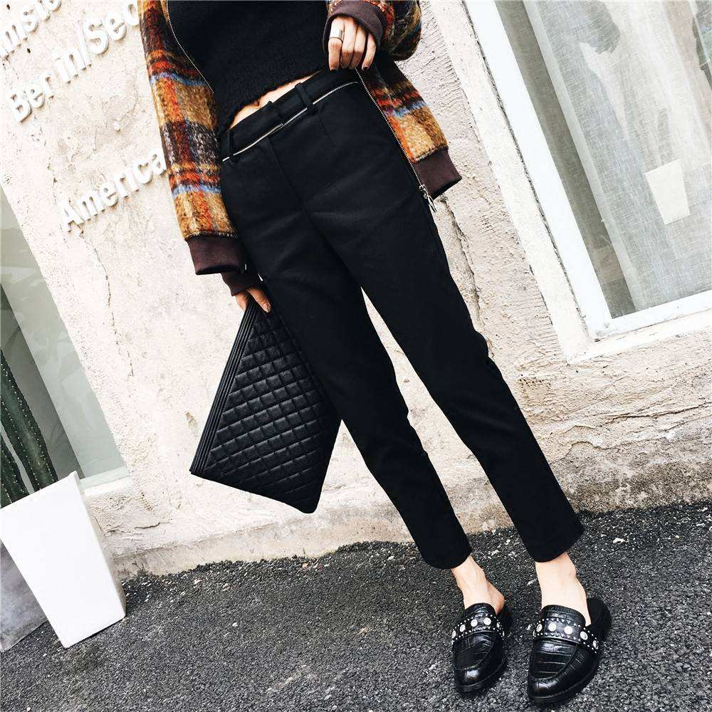 脚踝处开叉的裤子,脚踝处有毛毛的裤子