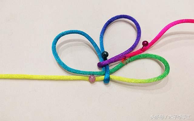 怎样编织酢浆草结的编法图解步骤,手工红绳编织蝴蝶结教程