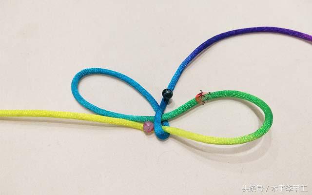 怎样编织酢浆草结的编法图解步骤,手工红绳编织蝴蝶结教程