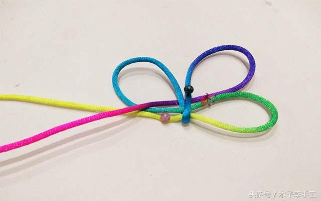 怎样编织酢浆草结的编法图解步骤,手工红绳编织蝴蝶结教程