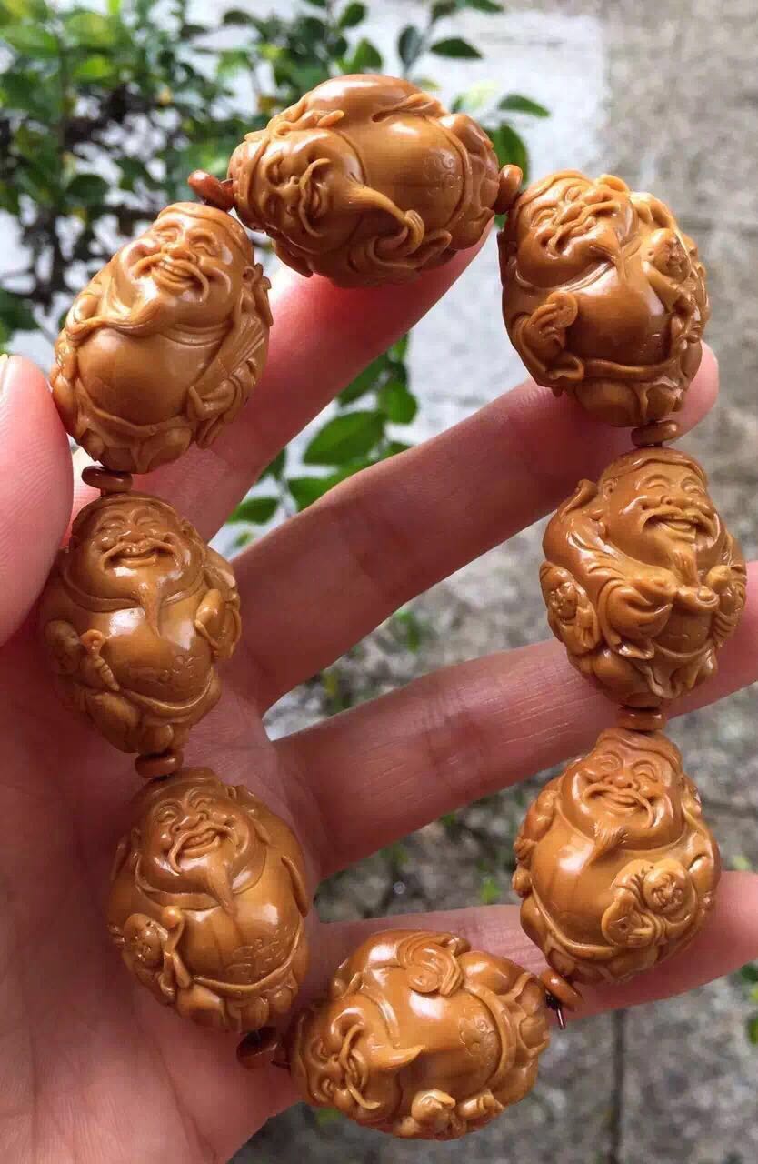 橄榄核雕有点轻怎么处理,橄榄核雕脏了可不可以洗