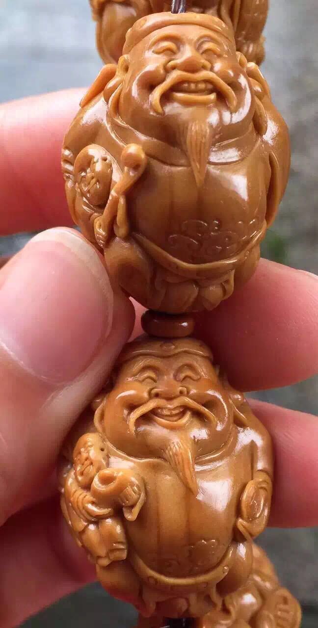 橄榄核雕有点轻怎么处理,橄榄核雕脏了可不可以洗