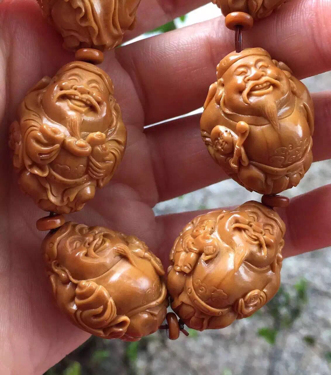 橄榄核雕有点轻怎么处理,橄榄核雕脏了可不可以洗