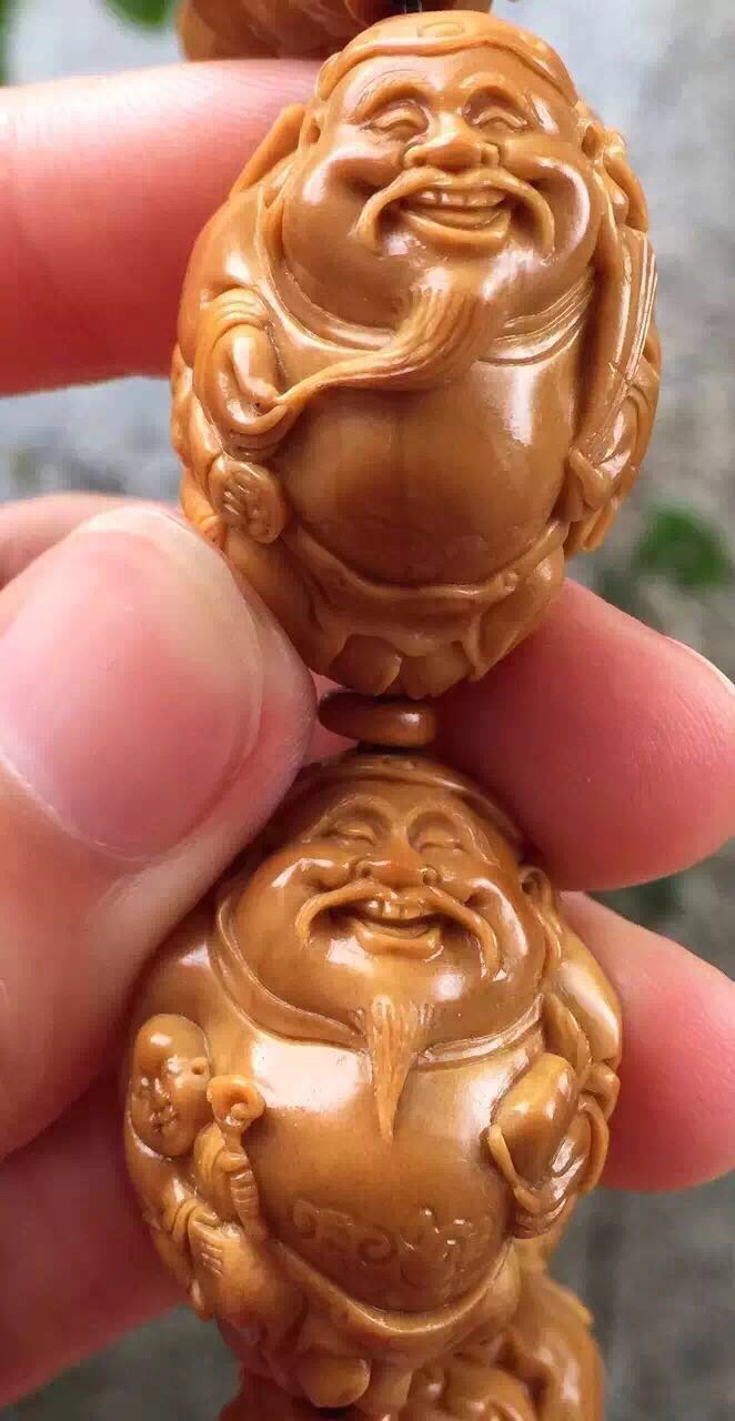 橄榄核雕有点轻怎么处理,橄榄核雕脏了可不可以洗