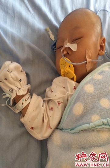 河南信阳男童被女子救,男童患癌父母为救他倾家荡产