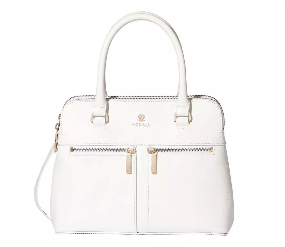 英伦风背什么包,好奇时髦精们今年都在背什么包