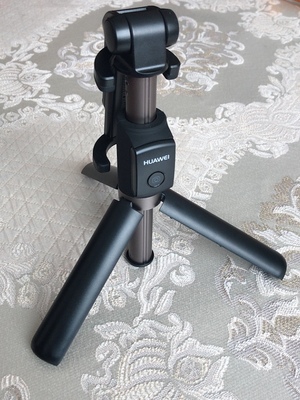 华为有线自拍杆的使用方法及操作,华为手机用自拍杆的使用方法图解