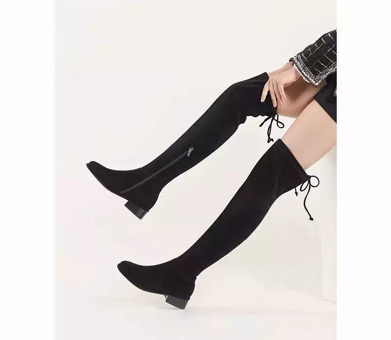 冬天的靴子是买小还是买大,冬季靴子如何买暖和