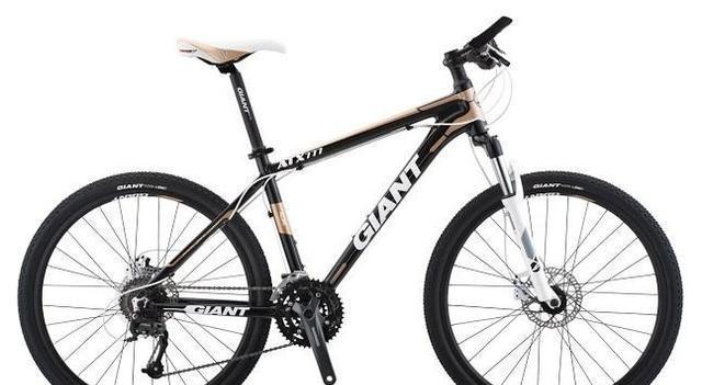 捷安特跟普通自行车的区别,捷安特xtc80029寸车圈山地车