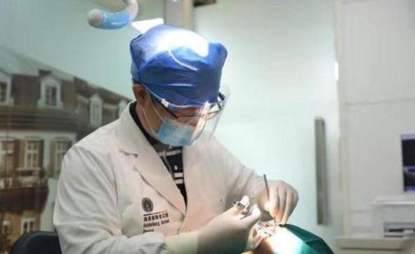 牙齿已经晃动可还是很难拔掉,怎么把晃动的牙齿自己拔掉