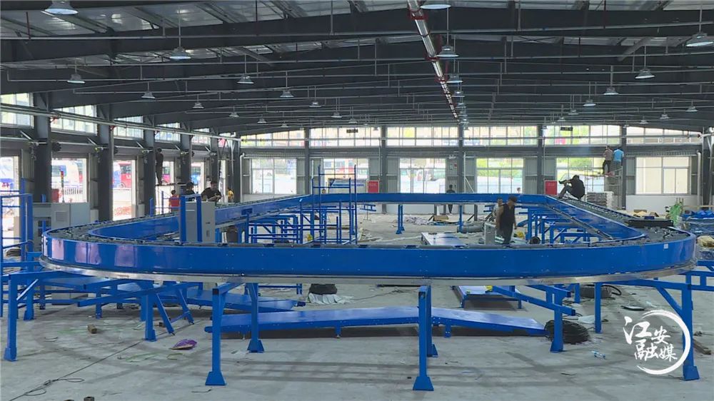 江安建设交邮金通构建城乡一体化物流体系