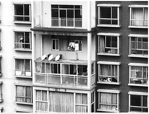 一个小区弄五间民宿违法不,一套房子被隔成九室