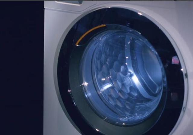 手动滚筒洗衣机开箱视频,全自动洗衣机打开图片