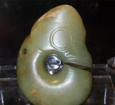 红山玉器真假图片对比,红山玉真假图对比