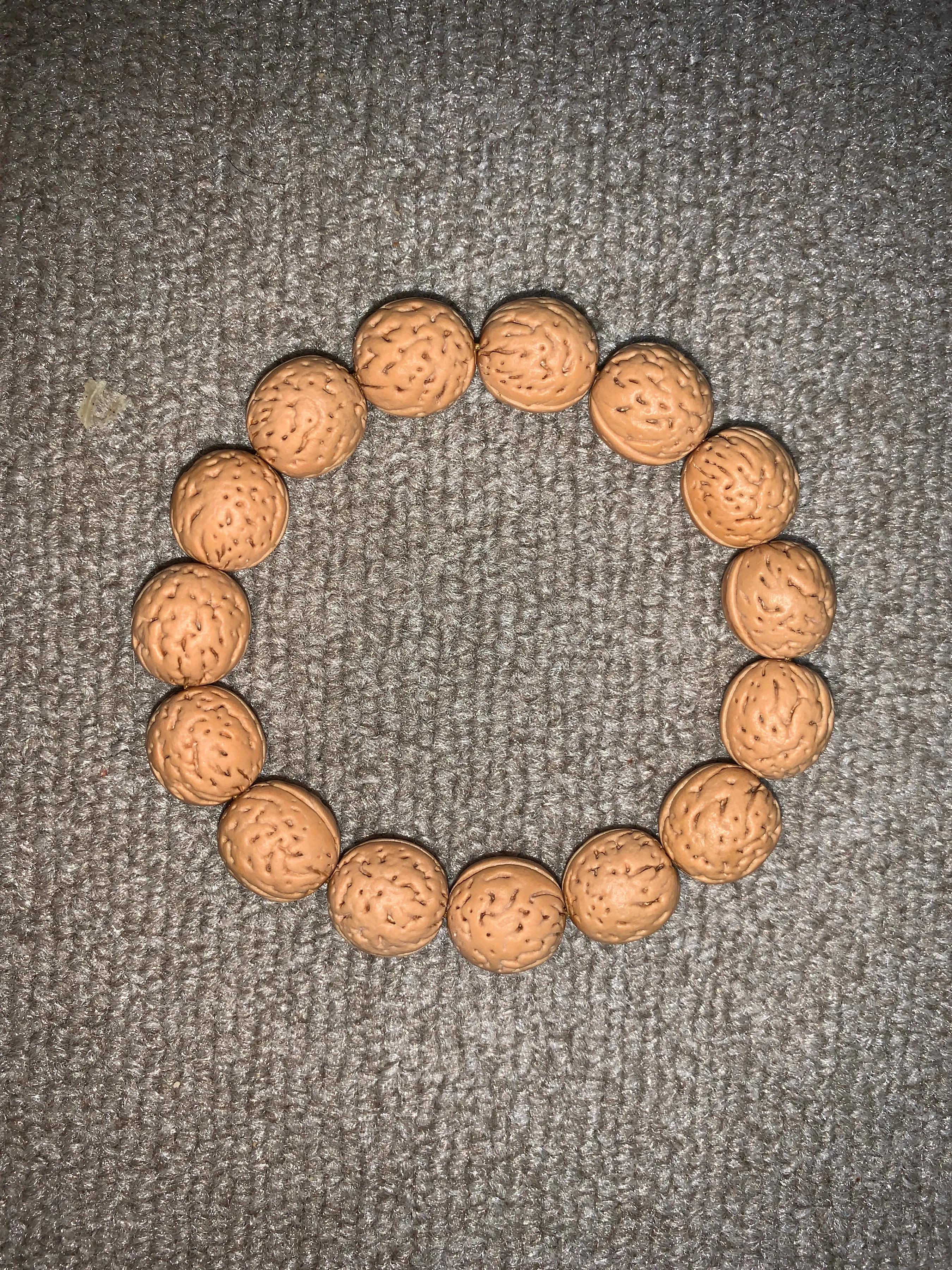 自制桃核手串的做法,自制桃核手串绳结视频